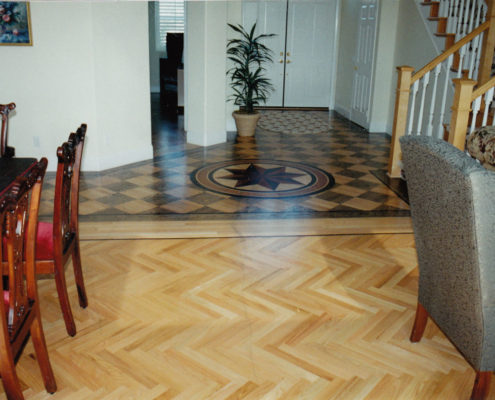 Red Oak Herringbone with Wenge feature strip, block Parquet stained to a checkerboard with Medallion.